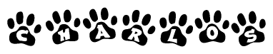 The image shows a series of animal paw prints arranged horizontally. Within each paw print, there's a letter; together they spell Charlos