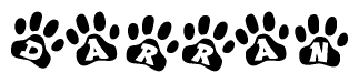 The image shows a series of animal paw prints arranged horizontally. Within each paw print, there's a letter; together they spell Darran