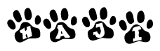 The image shows a series of animal paw prints arranged horizontally. Within each paw print, there's a letter; together they spell Haji