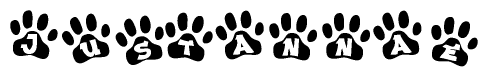 The image shows a series of animal paw prints arranged in a horizontal line. Each paw print contains a letter, and together they spell out the word Justannae.