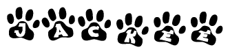 The image shows a series of animal paw prints arranged in a horizontal line. Each paw print contains a letter, and together they spell out the word Jackee.