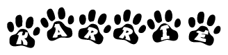 The image shows a series of animal paw prints arranged in a horizontal line. Each paw print contains a letter, and together they spell out the word Karrie.