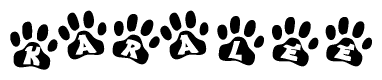 The image shows a series of animal paw prints arranged in a horizontal line. Each paw print contains a letter, and together they spell out the word Karalee.