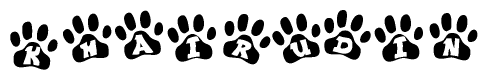 The image shows a series of animal paw prints arranged in a horizontal line. Each paw print contains a letter, and together they spell out the word Khairudin.
