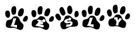 The image shows a series of animal paw prints arranged horizontally. Within each paw print, there's a letter; together they spell Lesly