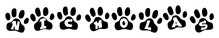 The image shows a series of animal paw prints arranged horizontally. Within each paw print, there's a letter; together they spell Nicholas