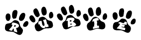 The image shows a row of animal paw prints, each containing a letter. The letters spell out the word Rubie within the paw prints.