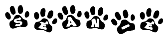 The image shows a row of animal paw prints, each containing a letter. The letters spell out the word Sean-e within the paw prints.