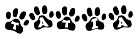 The image shows a series of animal paw prints arranged horizontally. Within each paw print, there's a letter; together they spell Tatia