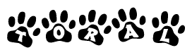 The image shows a series of animal paw prints arranged in a horizontal line. Each paw print contains a letter, and together they spell out the word Toral.