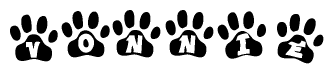 The image shows a row of animal paw prints, each containing a letter. The letters spell out the word Vonnie within the paw prints.
