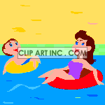 A mother and son floating on innertubes at the lake animation. Royalty-free animation # 120664