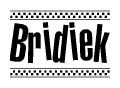 The image is a black and white clipart of the text Bridiek in a bold, italicized font. The text is bordered by a dotted line on the top and bottom, and there are checkered flags positioned at both ends of the text, usually associated with racing or finishing lines.