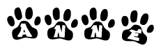 The image shows a series of animal paw prints arranged horizontally. Within each paw print, there's a letter; together they spell Anne