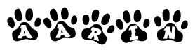 The image shows a series of animal paw prints arranged in a horizontal line. Each paw print contains a letter, and together they spell out the word Aarin.