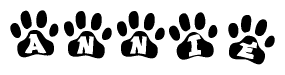 The image shows a series of animal paw prints arranged horizontally. Within each paw print, there's a letter; together they spell Annie