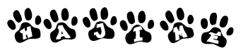 The image shows a row of animal paw prints, each containing a letter. The letters spell out the word Hajime within the paw prints.