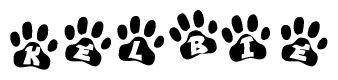The image shows a series of animal paw prints arranged horizontally. Within each paw print, there's a letter; together they spell Kelbie