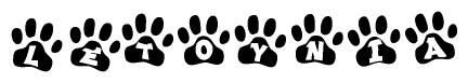 The image shows a series of animal paw prints arranged in a horizontal line. Each paw print contains a letter, and together they spell out the word Letoynia.