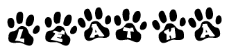 The image shows a series of animal paw prints arranged in a horizontal line. Each paw print contains a letter, and together they spell out the word Leatha.