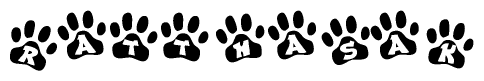 The image shows a series of animal paw prints arranged in a horizontal line. Each paw print contains a letter, and together they spell out the word Ratthasak.