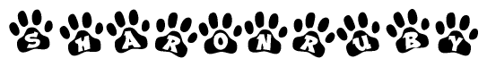 The image shows a row of animal paw prints, each containing a letter. The letters spell out the word Sharonruby within the paw prints.