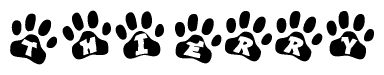 The image shows a series of animal paw prints arranged horizontally. Within each paw print, there's a letter; together they spell Thierry