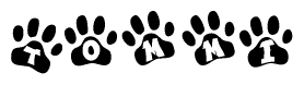 The image shows a series of animal paw prints arranged in a horizontal line. Each paw print contains a letter, and together they spell out the word Tommi.