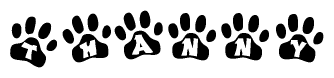 The image shows a row of animal paw prints, each containing a letter. The letters spell out the word Thanny within the paw prints.