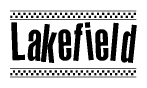 The image contains the text Lakefield in a bold, stylized font, with a checkered flag pattern bordering the top and bottom of the text.