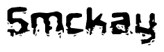 This nametag says Smckay, and has a static looking effect at the bottom of the words. The words are in a stylized font.