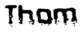 The image contains the word Thom in a stylized font with a static looking effect at the bottom of the words