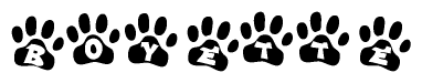 The image shows a series of animal paw prints arranged horizontally. Within each paw print, there's a letter; together they spell Boyette