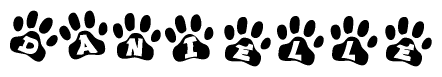 The image shows a row of animal paw prints, each containing a letter. The letters spell out the word Danielle within the paw prints.