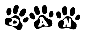 The image shows a row of animal paw prints, each containing a letter. The letters spell out the word Dan within the paw prints.