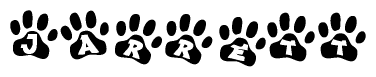 The image shows a series of animal paw prints arranged horizontally. Within each paw print, there's a letter; together they spell Jarrett