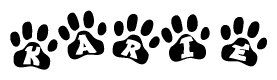 The image shows a series of animal paw prints arranged horizontally. Within each paw print, there's a letter; together they spell Karie