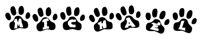 The image shows a row of animal paw prints, each containing a letter. The letters spell out the word Michael within the paw prints.