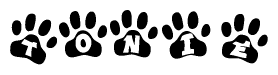 The image shows a row of animal paw prints, each containing a letter. The letters spell out the word Tonie within the paw prints.