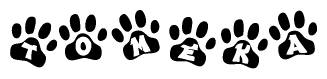 The image shows a series of animal paw prints arranged horizontally. Within each paw print, there's a letter; together they spell Tomeka
