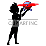 Silhouette of a boy playing with an airplane