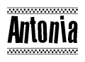 The image is a black and white clipart of the text Antonia in a bold, italicized font. The text is bordered by a dotted line on the top and bottom, and there are checkered flags positioned at both ends of the text, usually associated with racing or finishing lines.