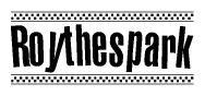 The image is a black and white clipart of the text Roythespark in a bold, italicized font. The text is bordered by a dotted line on the top and bottom, and there are checkered flags positioned at both ends of the text, usually associated with racing or finishing lines.