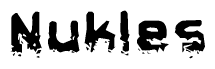 The image contains the word Nukles in a stylized font with a static looking effect at the bottom of the words