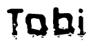The image contains the word Tobi in a stylized font with a static looking effect at the bottom of the words