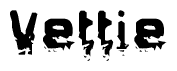 The image contains the word Vettie in a stylized font with a static looking effect at the bottom of the words