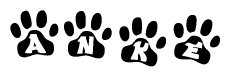 The image shows a series of animal paw prints arranged horizontally. Within each paw print, there's a letter; together they spell Anke