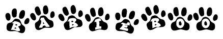 The image shows a row of animal paw prints, each containing a letter. The letters spell out the word Babieboo within the paw prints.