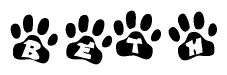 The image shows a row of animal paw prints, each containing a letter. The letters spell out the word Beth within the paw prints.