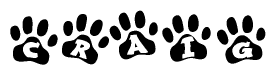 The image shows a series of animal paw prints arranged horizontally. Within each paw print, there's a letter; together they spell Craig